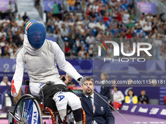 Beatrice Maria ''Bebe'' Vio Grandis of Italy competes against Rong Xiao of China during the Women's Foil Category B Semifinal at Gran Palais...