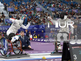 Beatrice Maria ''Bebe'' Vio Grandis of Italy competes against Rong Xiao of China during the Women's Foil Category B Semifinal at Gran Palais...