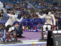 Beatrice Maria ''Bebe'' Vio Grandis of Italy competes against Rong Xiao of China during the Women's Foil Category B Semifinal at Gran Palais...