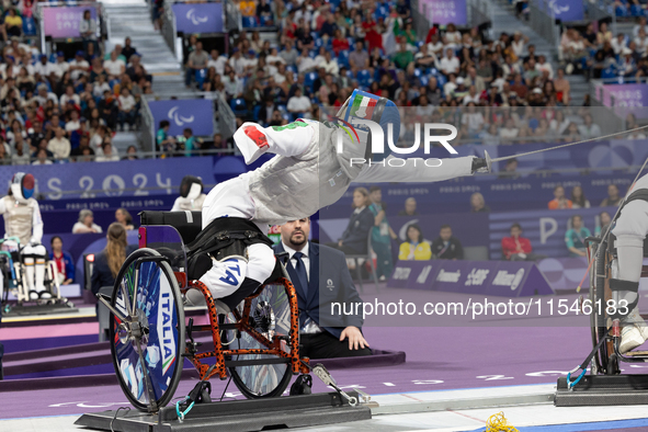 Beatrice Maria ''Bebe'' Vio Grandis of Italy competes against Rong Xiao of China during the Women's Foil Category B Semifinal at Gran Palais...