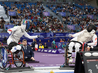 Beatrice Maria ''Bebe'' Vio Grandis of Italy competes against Rong Xiao of China during the Women's Foil Category B Semifinal at Gran Palais...