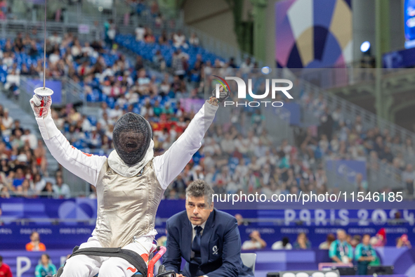 Rong Xiao of China reacts after she wins against Beatrice Maria ''Bebe'' Vio Grandis during the Women's Foil Category B Semifinal at Gran Pa...