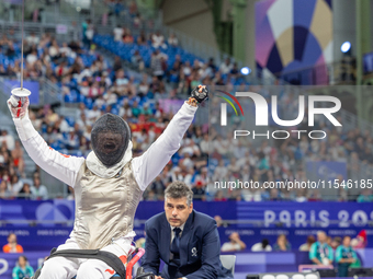 Rong Xiao of China reacts after she wins against Beatrice Maria ''Bebe'' Vio Grandis during the Women's Foil Category B Semifinal at Gran Pa...