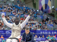 Rong Xiao of China reacts after she wins against Beatrice Maria ''Bebe'' Vio Grandis during the Women's Foil Category B Semifinal at Gran Pa...