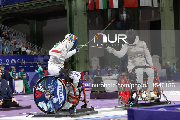 Beatrice Maria ''Bebe'' Vio Grandis of Italy competes against Rong Xiao of China during the Women's Foil Category B Semifinal at Gran Palais...