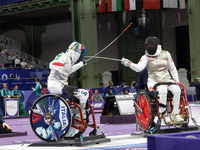 Beatrice Maria ''Bebe'' Vio Grandis of Italy competes against Rong Xiao of China during the Women's Foil Category B Semifinal at Gran Palais...