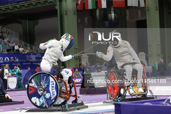 Beatrice Maria ''Bebe'' Vio Grandis of Italy competes against Rong Xiao of China during the Women's Foil Category B Semifinal at Gran Palais...