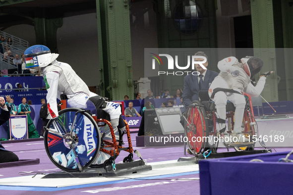 Beatrice Maria ''Bebe'' Vio Grandis of Italy competes against Rong Xiao of China during the Women's Foil Category B Semifinal at Gran Palais...