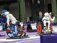 Beatrice Maria ''Bebe'' Vio Grandis of Italy competes against Rong Xiao of China during the Women's Foil Category B Semifinal at Gran Palais...