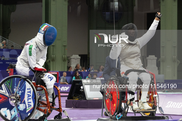 Beatrice Maria ''Bebe'' Vio Grandis of Italy competes against Rong Xiao of China during the Women's Foil Category B Semifinal at Gran Palais...