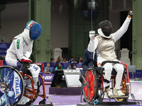 Beatrice Maria ''Bebe'' Vio Grandis of Italy competes against Rong Xiao of China during the Women's Foil Category B Semifinal at Gran Palais...