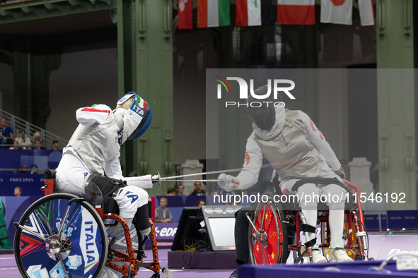 Beatrice Maria ''Bebe'' Vio Grandis of Italy competes against Rong Xiao of China during the Women's Foil Category B Semifinal at Gran Palais...