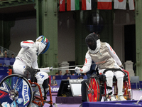 Beatrice Maria ''Bebe'' Vio Grandis of Italy competes against Rong Xiao of China during the Women's Foil Category B Semifinal at Gran Palais...