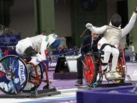 Beatrice Maria ''Bebe'' Vio Grandis of Italy competes against Rong Xiao of China during the Women's Foil Category B Semifinal at Gran Palais...