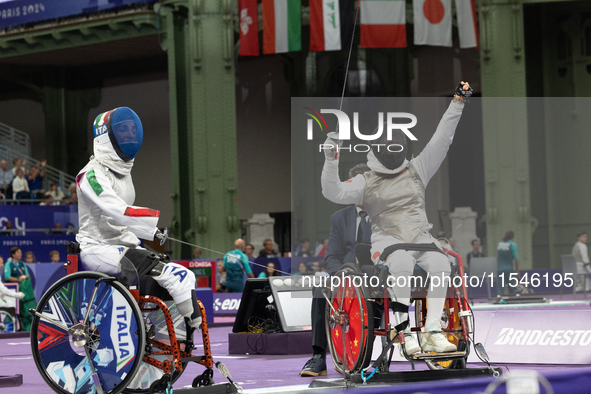 Beatrice Maria ''Bebe'' Vio Grandis of Italy competes against Rong Xiao of China during the Women's Foil Category B Semifinal at Gran Palais...