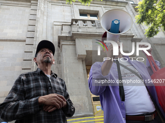 A group of people demonstrates outside the Supreme Court of Justice of the Nation in Mexico City, Mexico, on September 4, 2024, where they h...