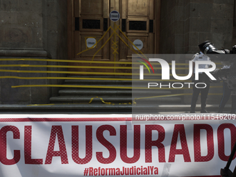 Police guard the exterior of the Supreme Court of Justice of the Nation in Mexico City, Mexico, on September 4, 2024, where a work stoppage...