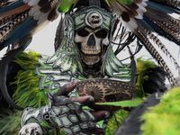 A pre-Hispanic dancer drinks pulque outside the Supreme Court of Justice of the Nation in Mexico City, Mexico, on September 4, 2024, where a...