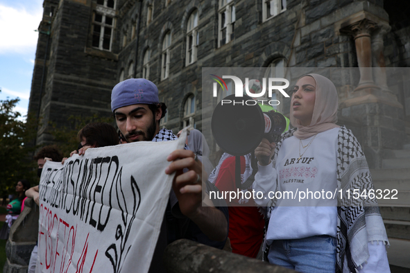 Pro-Palestine demonstrators protest on the steps of Healy Hall at Georgetown University in Washington, D.C. on September 4, 2024. 