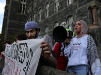 Pro-Palestine demonstrators protest on the steps of Healy Hall at Georgetown University in Washington, D.C. on September 4, 2024. (