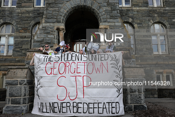 Pro-Palestine demonstrators protest on the steps of Healy Hall at Georgetown University in Washington, D.C. on September 4, 2024. 