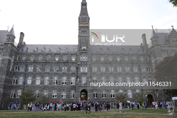 Pro-Palestine demonstrators protest on the steps of Healy Hall at Georgetown University in Washington, D.C. on September 4, 2024. 