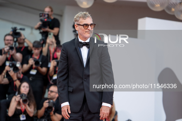 Joaquin Phoenix attends the ''Joker: Folie a Deux'' red carpet during the 81st Venice International Film Festival at Sala Grande in Venice,...