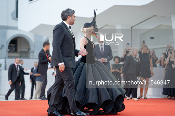 Lady Gaga and Michael Polansky attend the ''Joker: Folie a Deux'' red carpet during the 81st Venice International Film Festival at Sala Gran...