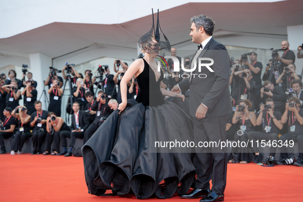 Lady Gaga and Michael Polansky attend the ''Joker: Folie a Deux'' red carpet during the 81st Venice International Film Festival at Sala Gran...