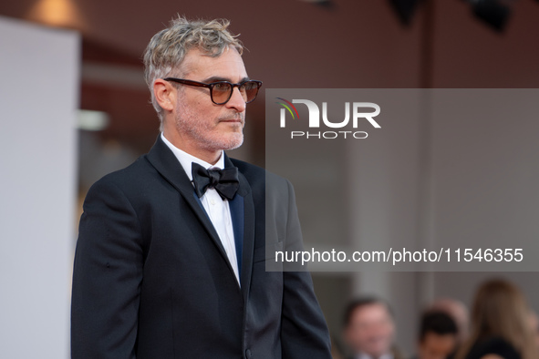 Joaquin Phoenix attends the ''Joker: Folie a Deux'' red carpet during the 81st Venice International Film Festival at Sala Grande in Venice,...