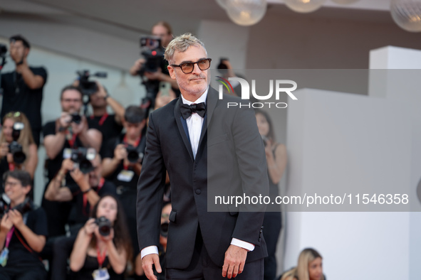 Joaquin Phoenix attends the ''Joker: Folie a Deux'' red carpet during the 81st Venice International Film Festival at Sala Grande in Venice,...