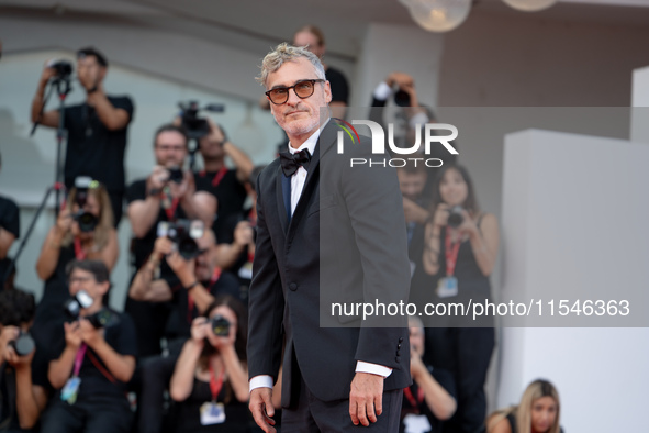 Joaquin Phoenix attends the ''Joker: Folie a Deux'' red carpet during the 81st Venice International Film Festival at Sala Grande in Venice,...