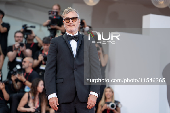 Joaquin Phoenix attends the ''Joker: Folie a Deux'' red carpet during the 81st Venice International Film Festival at Sala Grande in Venice,...