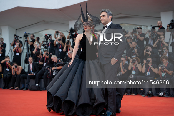 Lady Gaga and Michael Polansky attend the ''Joker: Folie a Deux'' red carpet during the 81st Venice International Film Festival at Sala Gran...