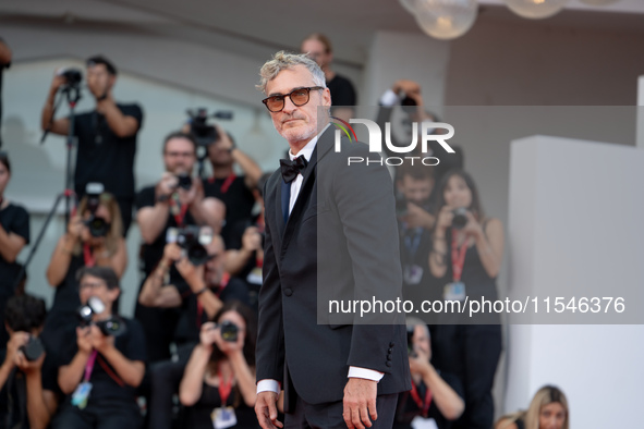 Joaquin Phoenix attends the ''Joker: Folie a Deux'' red carpet during the 81st Venice International Film Festival at Sala Grande in Venice,...