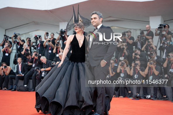 Lady Gaga and Michael Polansky attend the ''Joker: Folie a Deux'' red carpet during the 81st Venice International Film Festival at Sala Gran...