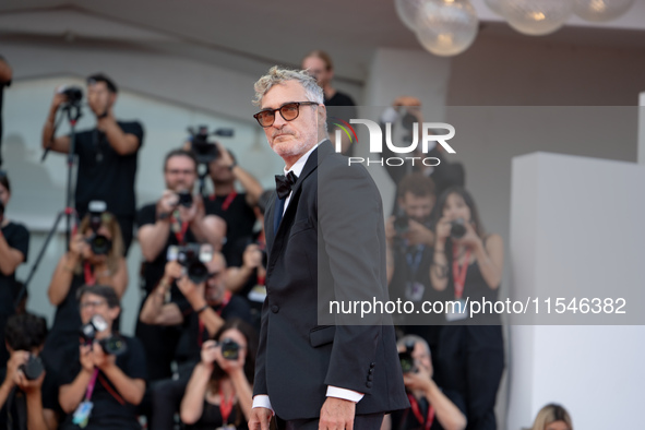 Joaquin Phoenix attends the ''Joker: Folie a Deux'' red carpet during the 81st Venice International Film Festival at Sala Grande in Venice,...