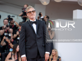 Joaquin Phoenix attends the ''Joker: Folie a Deux'' red carpet during the 81st Venice International Film Festival at Sala Grande in Venice,...