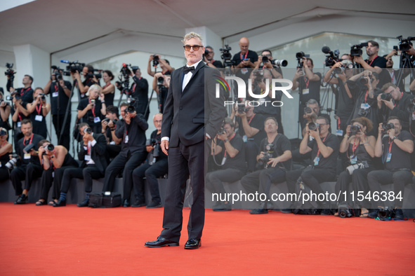 Joaquin Phoenix attends the ''Joker: Folie a Deux'' red carpet during the 81st Venice International Film Festival at Sala Grande in Venice,...