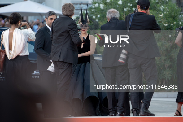 Lady Gaga and Michael Polansky attend the ''Joker: Folie a Deux'' red carpet during the 81st Venice International Film Festival at Sala Gran...