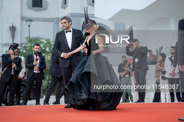 Lady Gaga and Michael Polansky attend the ''Joker: Folie a Deux'' red carpet during the 81st Venice International Film Festival at Sala Gran...