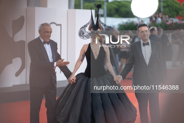 Venice Film Festival Director Alberto Barbera, Lady Gaga, and Biennale President Pietrangelo Buttafuoco attend the ''Joker: Folie a Deux'' r...