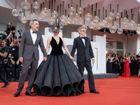 Joaquin Phoenix, Lady Gaga, and Director Todd Phillips attend the ''Joker: Folie a Deux'' red carpet during the 81st Venice International Fi...