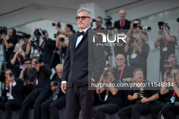 Joaquin Phoenix attends the ''Joker: Folie a Deux'' red carpet during the 81st Venice International Film Festival at Sala Grande in Venice,...