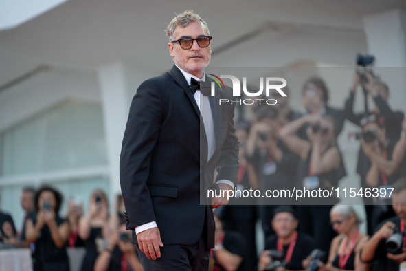 Joaquin Phoenix attends the ''Joker: Folie a Deux'' red carpet during the 81st Venice International Film Festival at Sala Grande in Venice,...