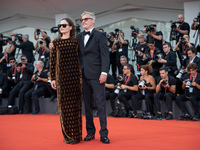 Joaquin Phoenix and Rain Phoenix attend the ''Joker: Folie a Deux'' red carpet during the 81st Venice International Film Festival at Sala Gr...