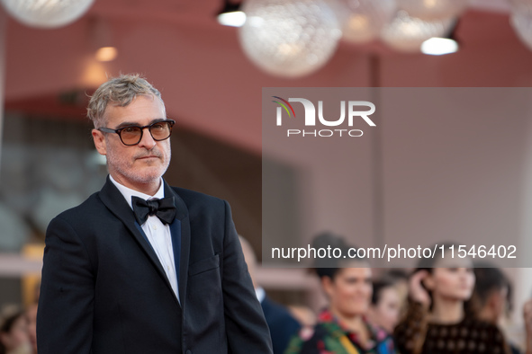 Joaquin Phoenix attends the ''Joker: Folie a Deux'' red carpet during the 81st Venice International Film Festival at Sala Grande in Venice,...