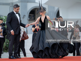 Lady Gaga and Michael Polansky attend the ''Joker: Folie a Deux'' red carpet during the 81st Venice International Film Festival at Sala Gran...