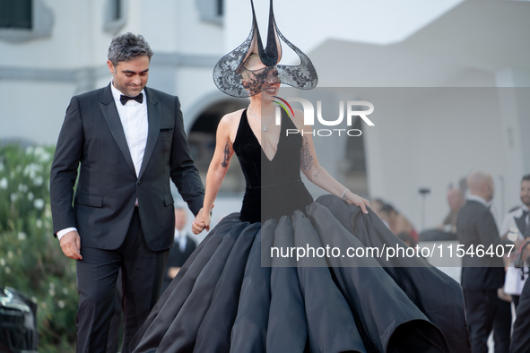 Lady Gaga and Michael Polansky attend the ''Joker: Folie a Deux'' red carpet during the 81st Venice International Film Festival at Sala Gran...