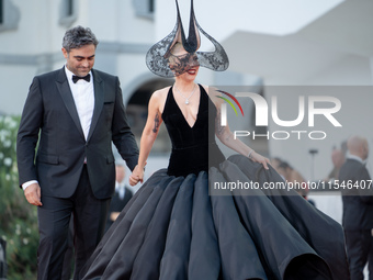 Lady Gaga and Michael Polansky attend the ''Joker: Folie a Deux'' red carpet during the 81st Venice International Film Festival at Sala Gran...